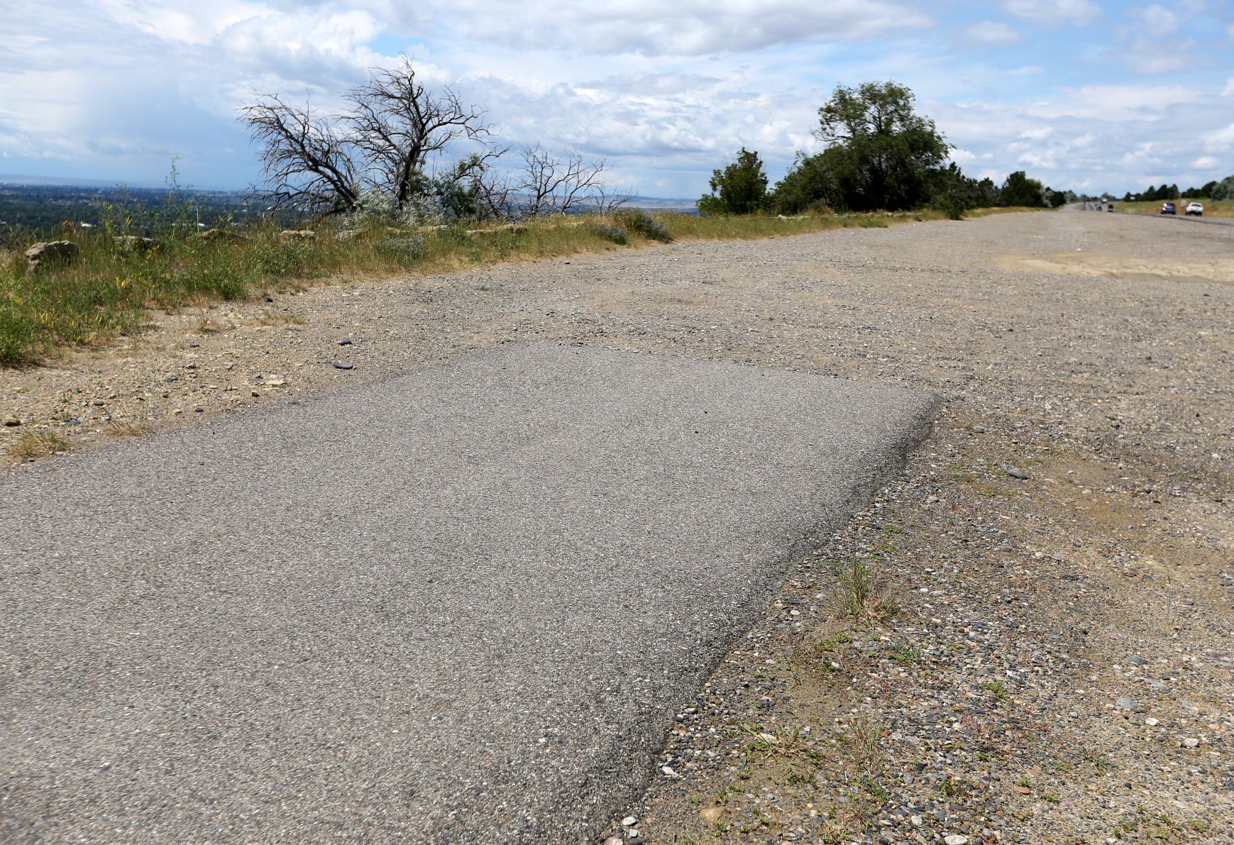 The paved bike trail along the Rimrocks